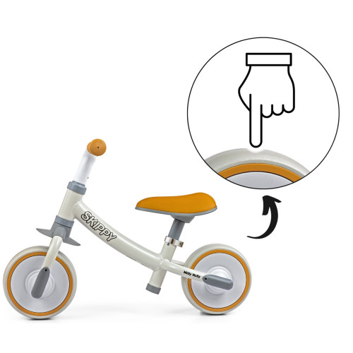 Odrážadlo Skippy Milly Mally – EVA kolesá, 18m+, ergonomické, biele, sivé